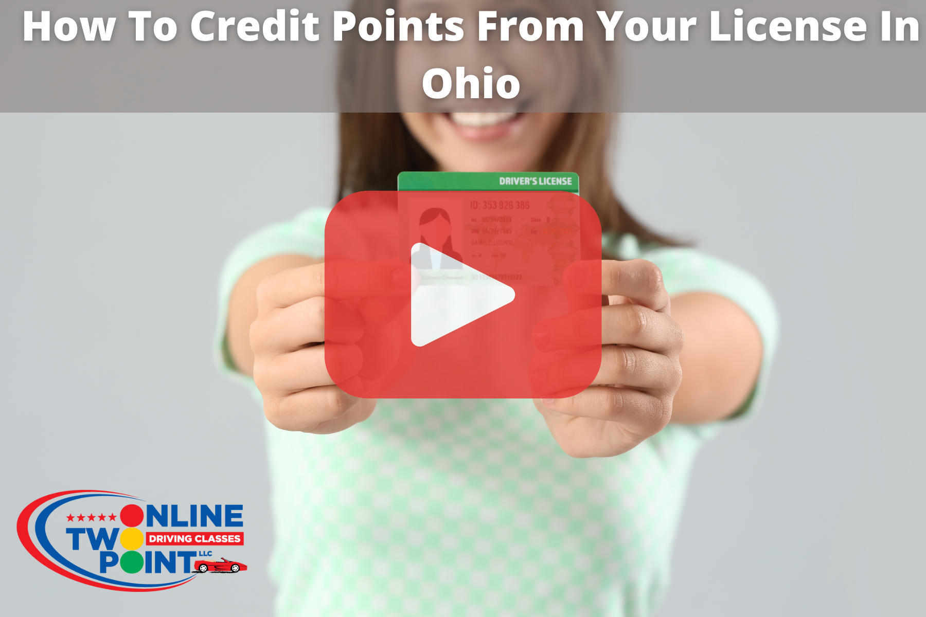 Woman holding license on hands.