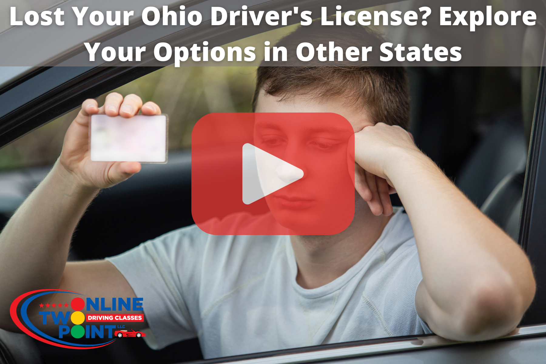 Man with an upset expression, holding drivers license while siting on car.