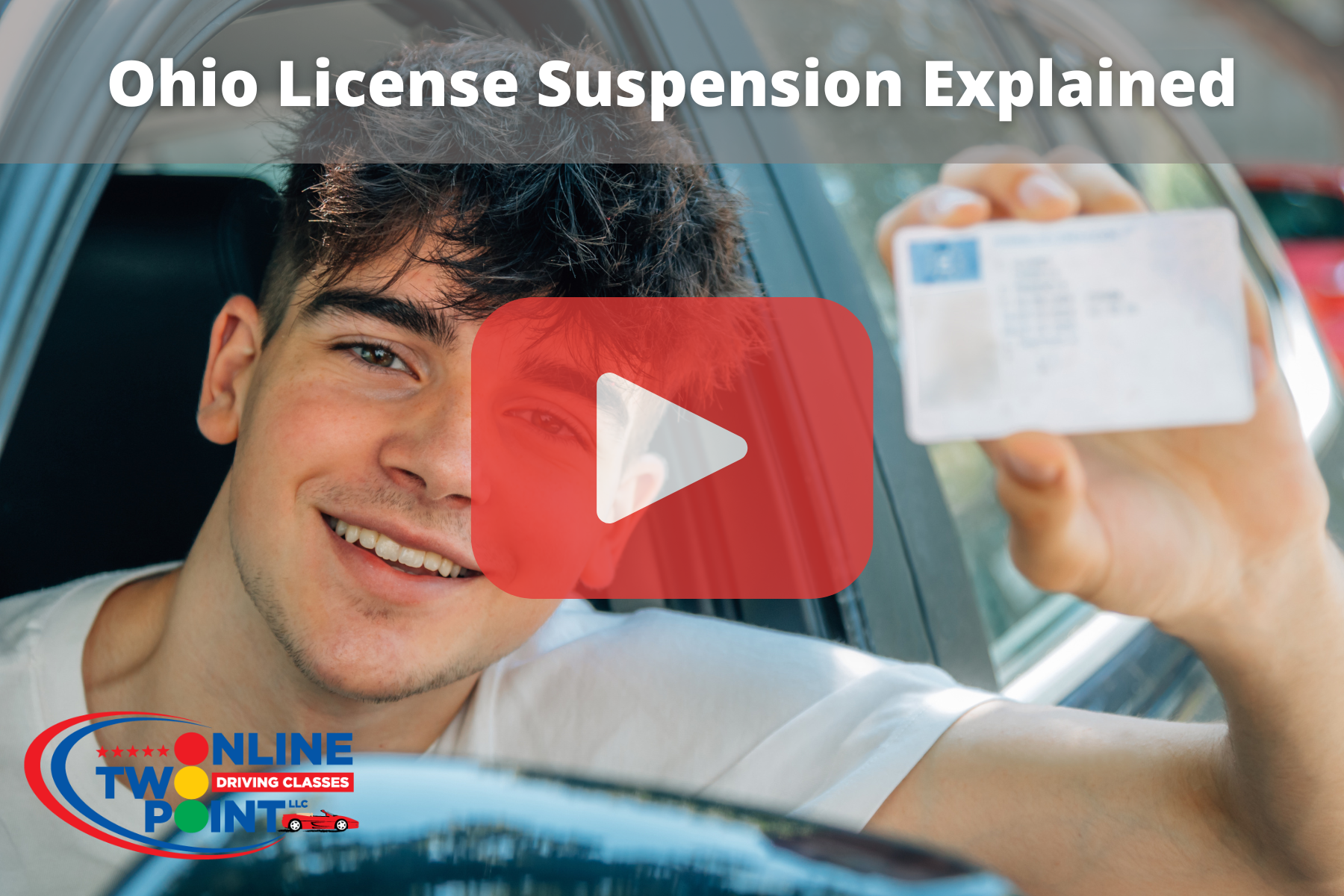 Younf man looking out the window while holding dirvers license