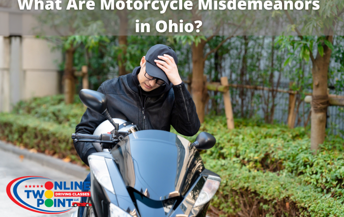 Image with the title “What Are Motorcycle Misdemeanors in Ohio?” showing a motorcyclist sitting with his hand on his head in frustration.