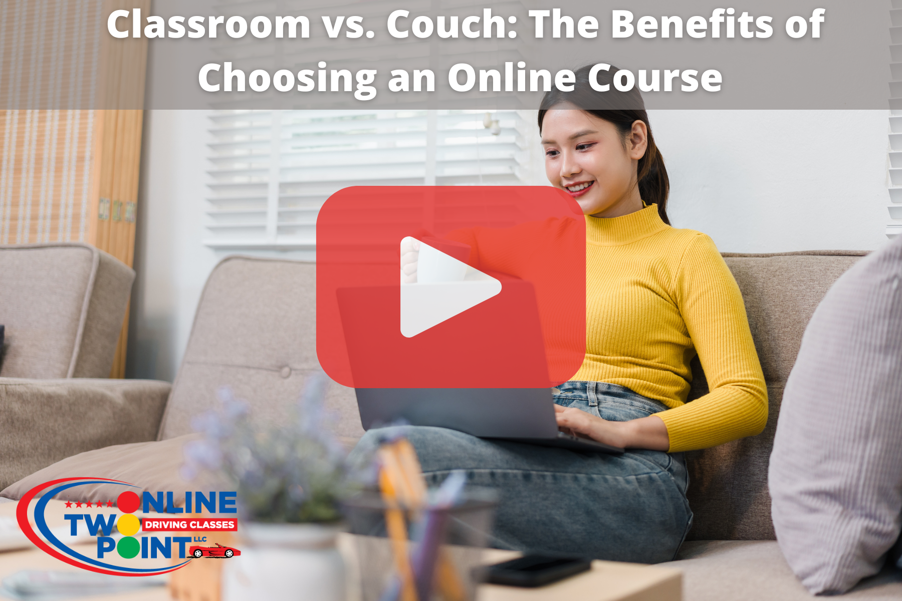 Woman sitting on couch while working on laptop.