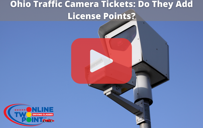 Traffic camera with red play button overlay.